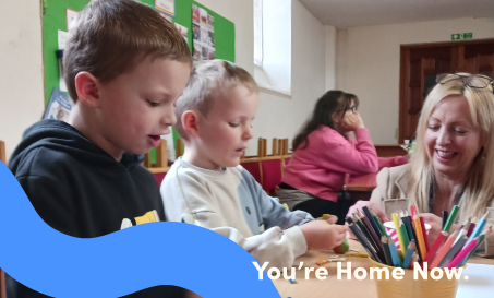 Hayley Selway CEO of Two Rivers Housing, crafting with children at one of our holiday clubs.